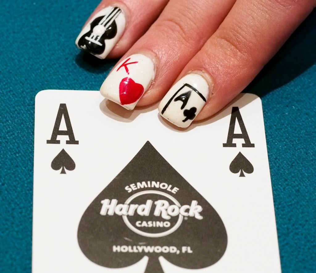 Yana, one of the dealers here at the Seminole Hard Rock Hotel & Casino, had her nails done in honor of both the Hard Rock (the electric guitar) and the poker tournament.