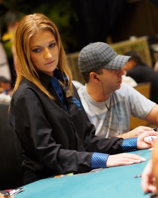 Yana deals a hand in the Day 1B field of Event 7 ($560 NLHE w/ $1 Million Guarantee).