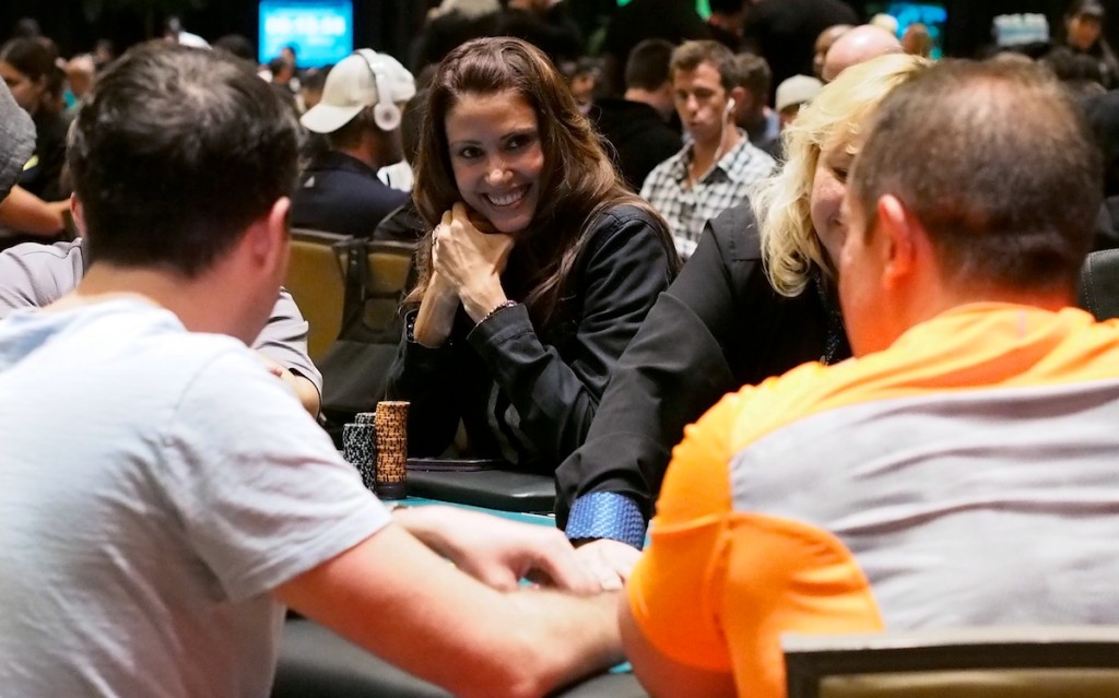 Actress Shannon Elizabeth seems to be having fun and gaining chips now that she shares a table with poker pros Andrew Badecker (foreground, left) and Will Failla (foreground, right).
