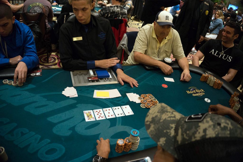 Bob Gelin, in the 1-seat, waits for the other tables to complete